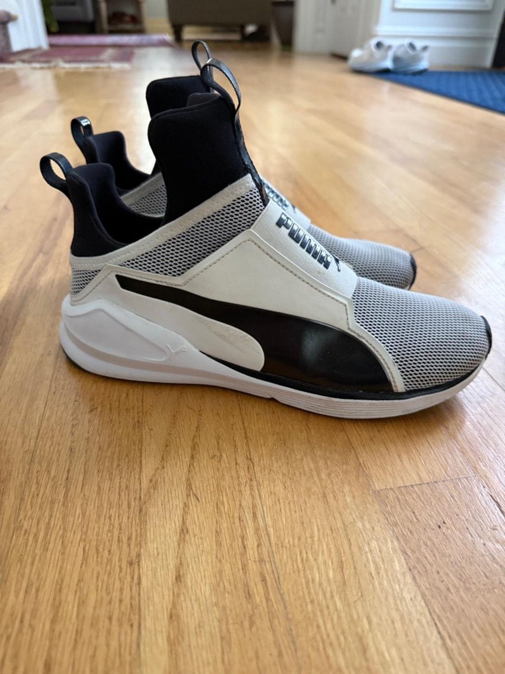 Puma women’s Slip-On Athletic Sneakers - White & Black